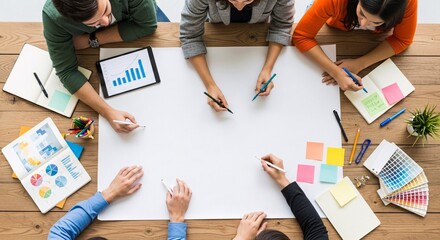 Collaborative Business Meeting and Brainstorming Session Around a Large White Paper	