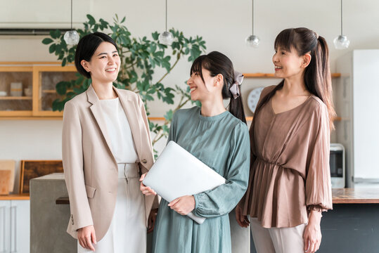 Businesswoman, designer, working woman with laptop in casual clothes (dress code not required)
