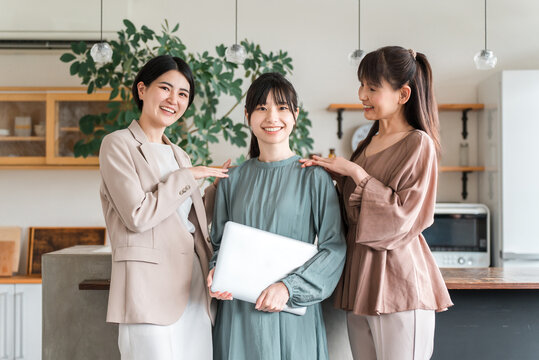 Businesswoman, designer, working woman with laptop in casual clothes (dress code not required)
