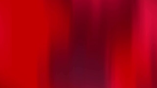 Maroon background displays a red abstract background with vertical blurry gradients creating depth.