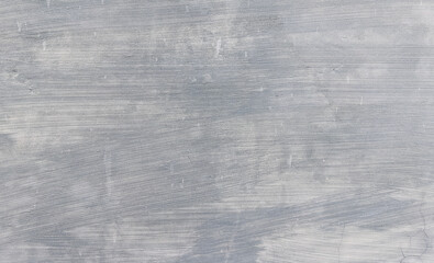 Close-up of smooth plastered cement wall surface with soft gray tones, perfect for modern background, architecture projects, and minimal industrial design use.