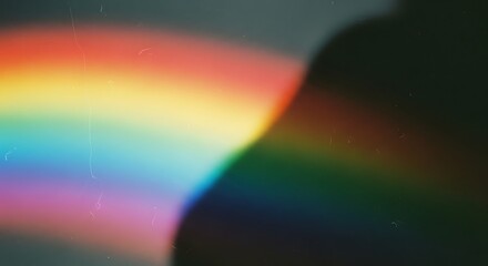 Abstract colorful light leak overlay with vintage film grain texture