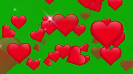 Red hearts floating and sparkling on a vibrant green screen background symbolizing love romance and celebration for various occasions like Valentines Day anniversaries or romantic gestures.