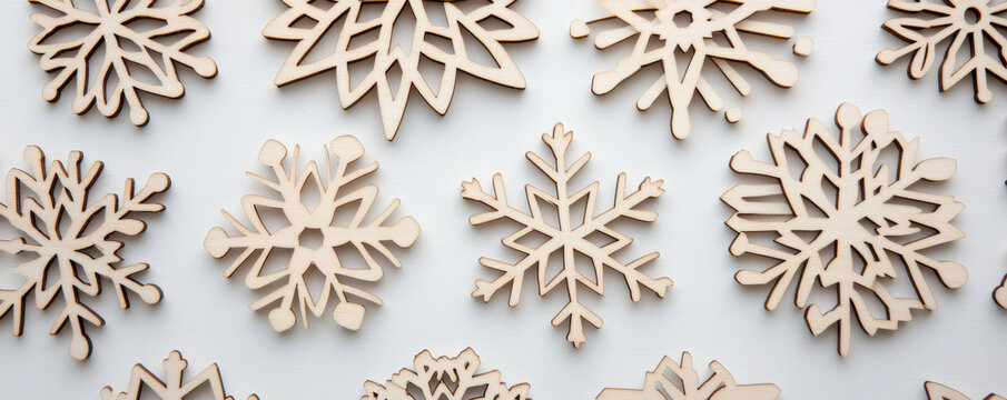 Wooden snowflake ornament christmas decoration pattern background with festive winter holiday design and natural material style - Powered by Adobe