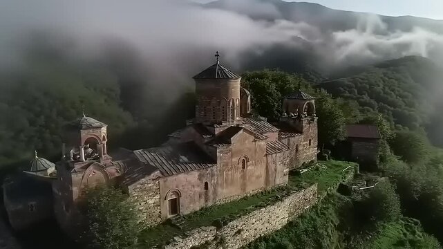 Ancient monastery in misty mountains.