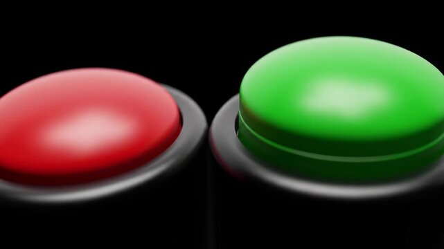 Close-up of a red and green button side by side on a black surface, with blurry edges and soft lighting