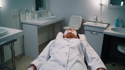 Peaceful woman expects, Relaxed woman confidently awaiting her upcoming medical operation today, Tranquil female patiently and confidently anticipates her scheduled health care procedure