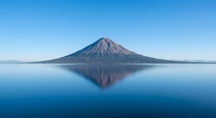 Fototapeta premium Ha Long Bay, Vietnam Mount Haruna reflection on serene water surface under clear sky