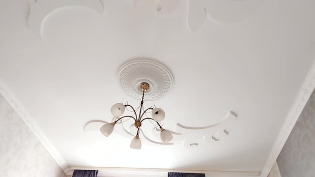 Detail of white ceiling medallion and cornice camera movement Minimal interior classic vibe and home coziness Perfect b roll for design and decor content nobody