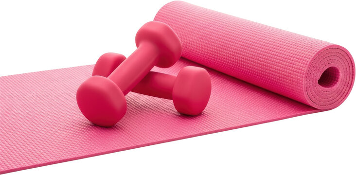 Two pink dumbbells resting on a textured pink yoga mat with the mat rolled on the right side isolate fitness exercise workout health sport equipment training