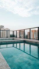 Modern Pool Terrace with Cityscape. Moema neighborhood, São Paulo