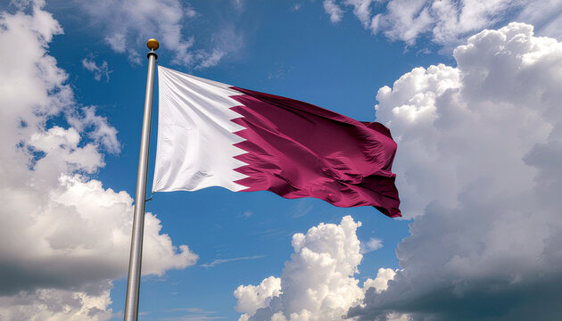 Majestic Qatari flag proudly waves against a dramatic sky, symbolizing national pride and heritage, perfect for patriotic projects.