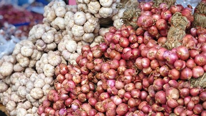Garlic and shallots in market.