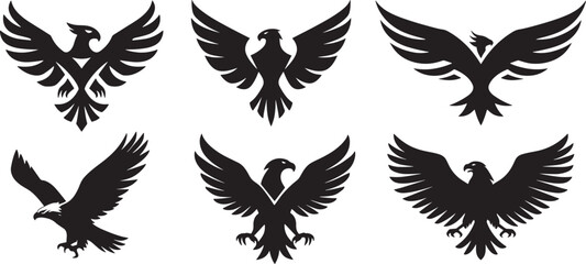 Set of six black eagle silhouettes with spread wings in various flying and attacking poses, strong and bold heraldic bird designs symbolizing power, freedom, and courage.