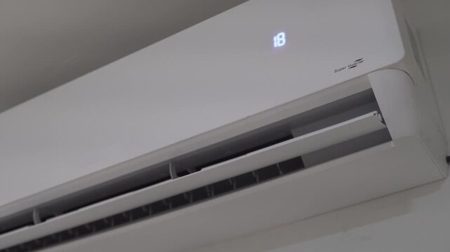 Air conditioner turning on and cooling room