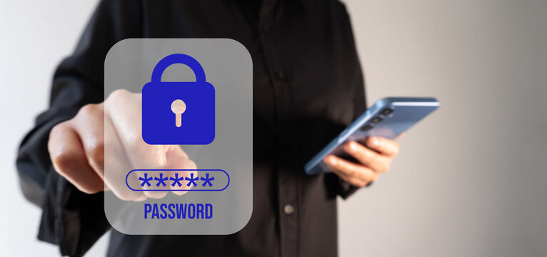 A businesswoman holding a smartphone while pointing forward at a padlock with a password.