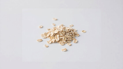 Rolled Oats on White Background: Healthy Breakfast Food Concept