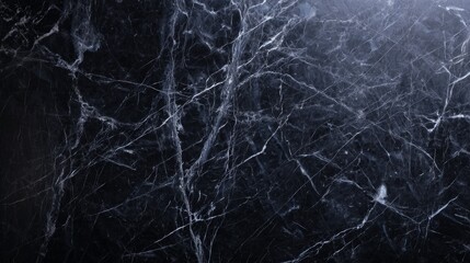 Explore the beauty of natural stone with a close-up shot of a marble texture. The intricate veins and subtle color variations in the stone create an elegant and timeless design, perfect for a desktop 