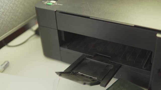 Office printer printing important business documents