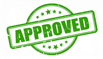 Approved Stamp: A detailed view of a green rubber stamp with APPROVED boldly printed, embodying endorsement and authorization.