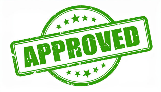 Approved Stamp: A detailed view of a green rubber stamp with APPROVED boldly printed, embodying endorsement and authorization.