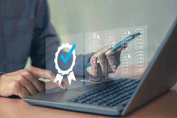 Digital document approval checklist on laptop screen. Productivity and business technology concept.