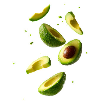 Sliced avocados falling on a transparent background with vibrant green color and rich texture