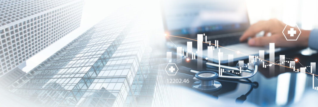 Healthcare business concept. Hospital doctor using laptop cpmputer with medical financial graph growth chart, data analysis, Health business finance and investment growth