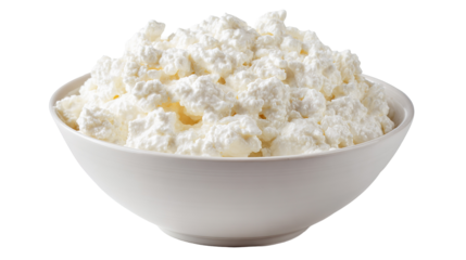 Variety of dried pasta shapes displayed in a white container on a white