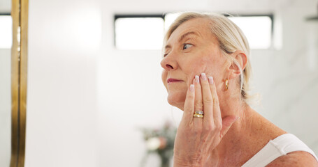 Woman, check face and skincare in mirror for inspection, dry skin and facial texture in bathroom....