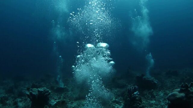 Vent Origin Hydrothermal vent bubbles rising from the seafloor Low angle, looking up from near the seafloor vent opening, emphasizing the source of the rising bubbles.