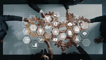 A diverse team collaborates on a business strategy involving Internet of Things, showcasing innovative ideas and modern technology through interconnected design elements. Raster - Powered by Adobe