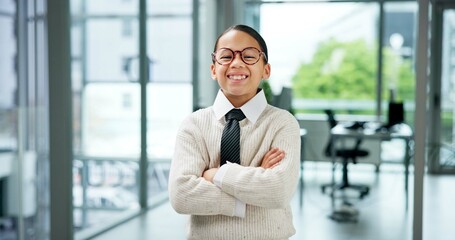 Arms crossed, portrait and smile of girl in office for cosplay, dress up or pretend career. About us, child development and costume with happy kid in workplace for fantasy, future or role play