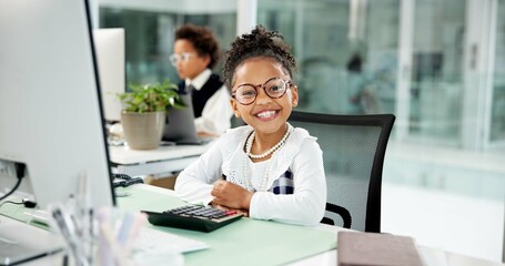 Business, computer and portrait of girl child in coworking office for finance cosplay or dress up. Calculator, costume and work experience with happy kid at desk for accounting, planning or research