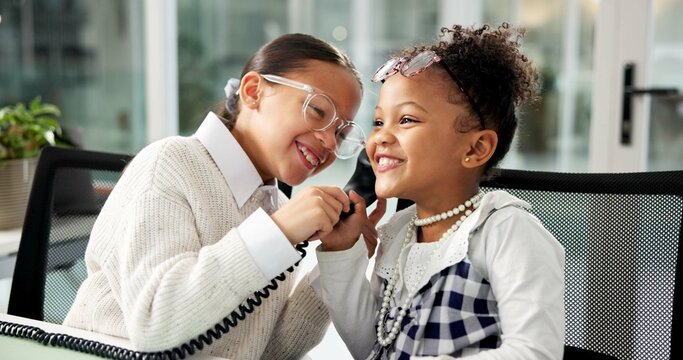 Laugh, phone call and children in office for business, deal or negotiation with communication. Happy, landline and girl kids on mobile discussion for cosplay with corporate career in workplace.