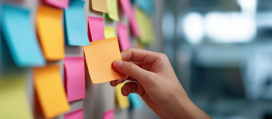 Sticky Note Post It Board Office. Business people meeting at office and use post it notes to share idea. Brainstorming concept. Sticky note on glass wall or blackboard. Set of colorful blank notes.