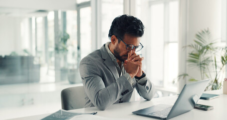 Frustrated, businessman or headache with stress, laptop or eye strain for deadline in office. Tired man, employee or analyst with migraine on computer for mistake, pressure or overworked in workplace
