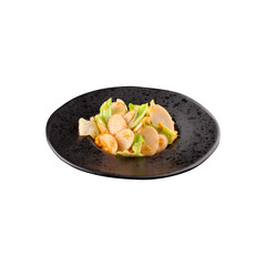 Delicious shrimp and asparagus pasta dish on a dark plate