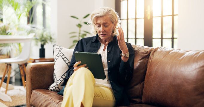 Tablet, home and senior woman with error, online problem or confused in living room. Technology, elderly person and glitch on sofa, network loss or connection fail with internet issue in retirement - Powered by Adobe