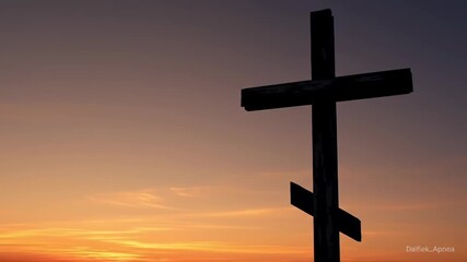 Orthodox cross silhouetted against a sunrise sky, perfect for religious content or backgrounds - Powered by Adobe