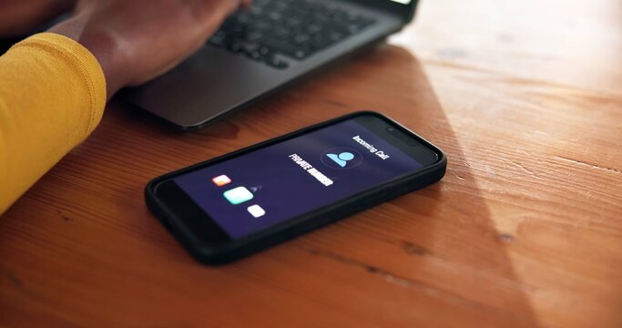 Call, phone screen and ringing with person at desk in home office for accounting or finance. Communication, private number and remote work with mobile on table in apartment for unknown contact