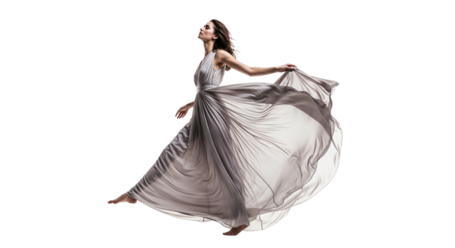 Beautiful woman in flowing dress dancing gracefully in a studio with white background