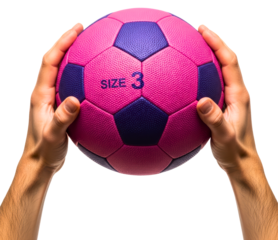 Male hands holding a pink and purple size three soccer ball isolated on transparent background