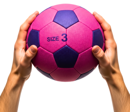 Male hands holding a pink and purple size three soccer ball isolated on transparent background