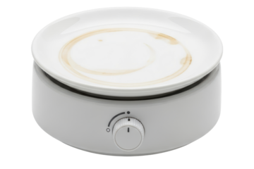 Electric mug warmer with a dirty plate and coffee stain isolated on transparent background