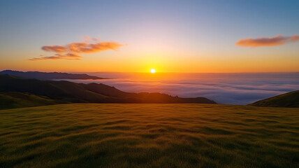 Obraz premium Sunrise, fog, rolling hill, grass, landscape, peaceful morning light over distant mountain