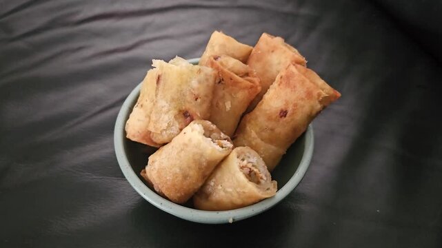 dried rose petals Lumpia bihun,Risol bihun,Fried spring roll with filled vermicelli and vegetables.Indonesian fried snack,Gorengan,Various Indonesian fritter,usually eat for snack,breakfast and break 