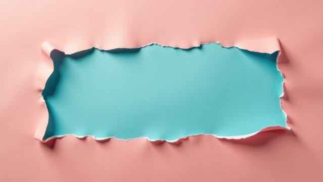 A close-up view of a torn piece of paper on a bright pink background