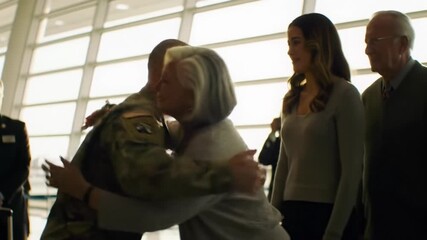 Bald caucasian soldier in camouflage reunites with elderly mother, young woman, and elderly man in a modern airport bathed in golden hour light. Emotional family homecoming concept - Powered by Adobe