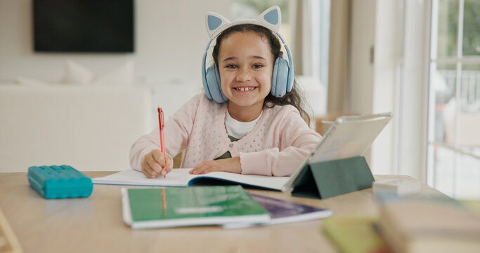 Home, portrait and child with headphones, online education and listening to audio lesson or writing. Happy, student and girl with tech for homework, elearning and development with notebook in USA